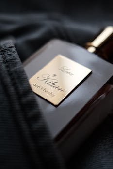 Elegant close-up of a luxury perfume bottle wrapped in elegant fabric, highlighting its minimalist design.